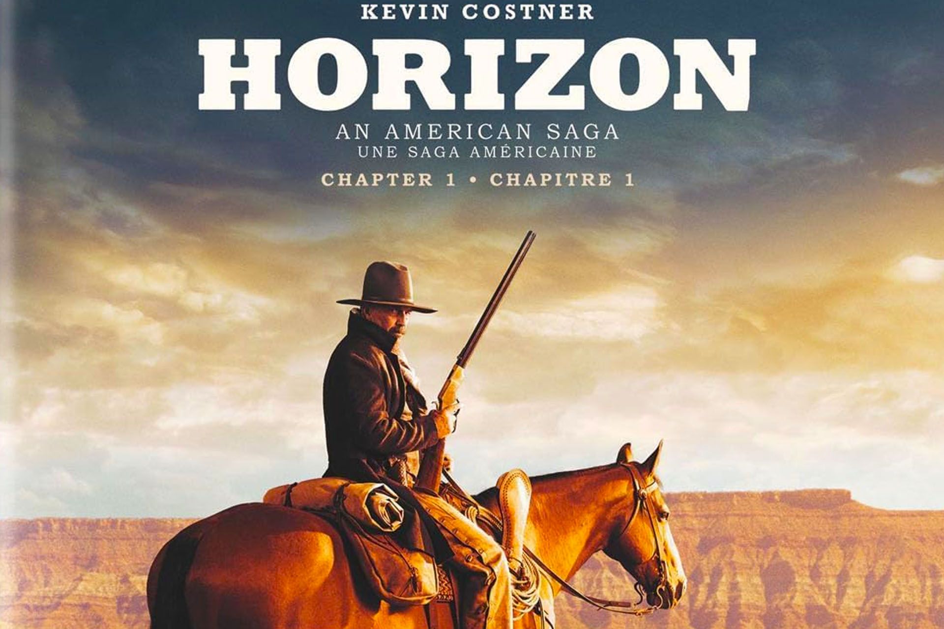 A cowboy on horseback holding a rifle, set against a desert landscape. Movie poster for Horizon: An American Saga