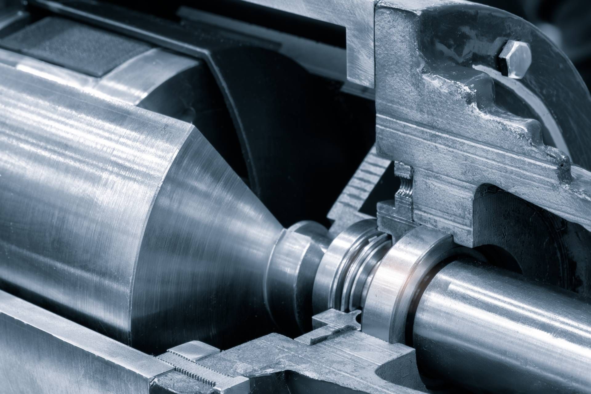 Cross-section of industrial machine with metal components.
