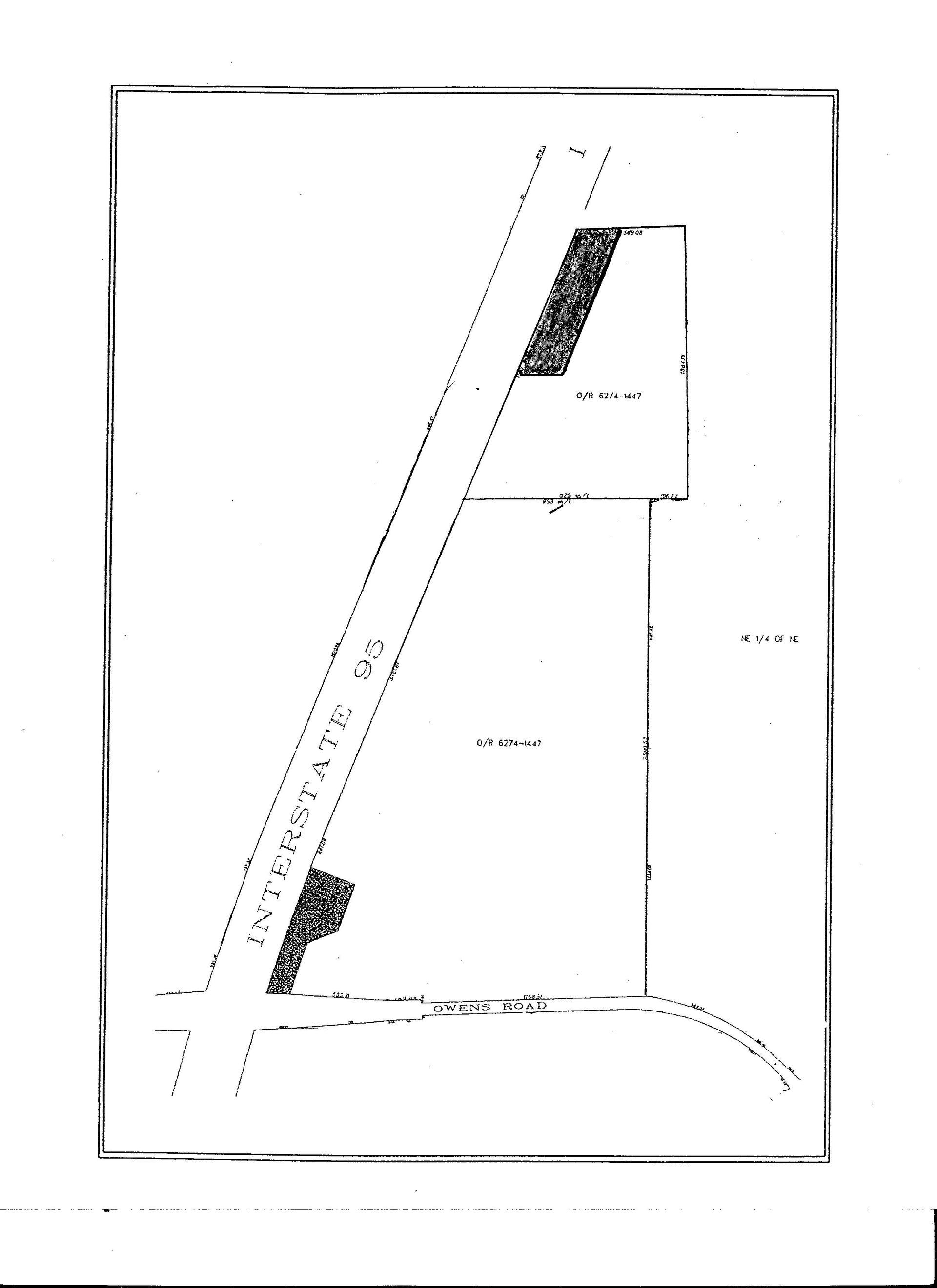 A black and white drawing of a road and a building.