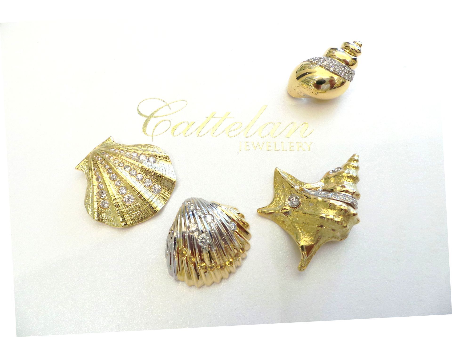 Cattelan - conchiglie in oro 750 e diamanti