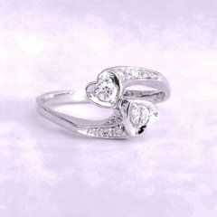 Cattelan - anello oro bianco 750 e diamanti - mod. contrariè cuori