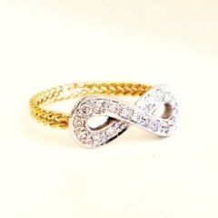 Cattelan - anello oro bianco e giallo 750 con diamanti - mod. Infinito