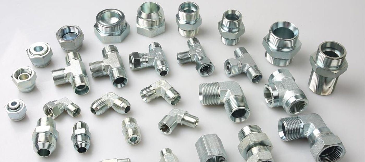 A machine is sitting in a room with a lot of wires coming out of it.