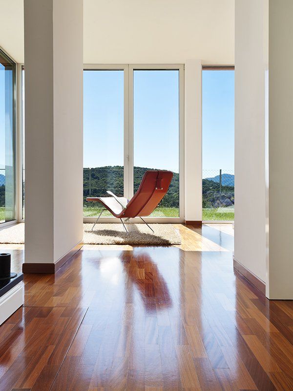 Modern House With Wooden Floor — Floor Repair in Lismore, NSW
