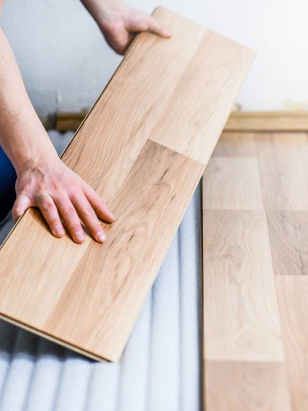 Worker Installing Timber Floor — Floor Installation in Lismore, NSW