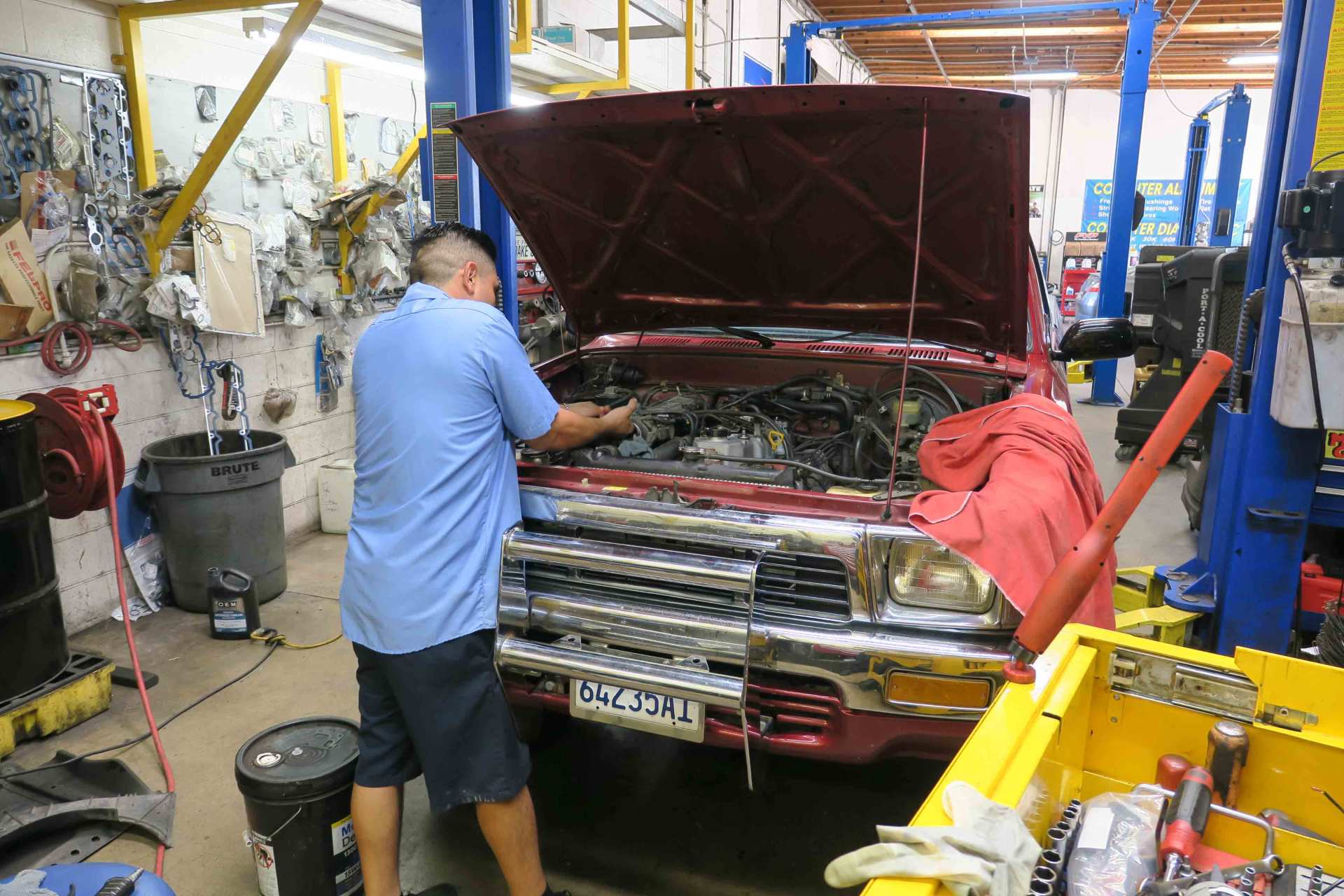 Engine Air Filters — Man Fixing Car Engine in Ontario, California
