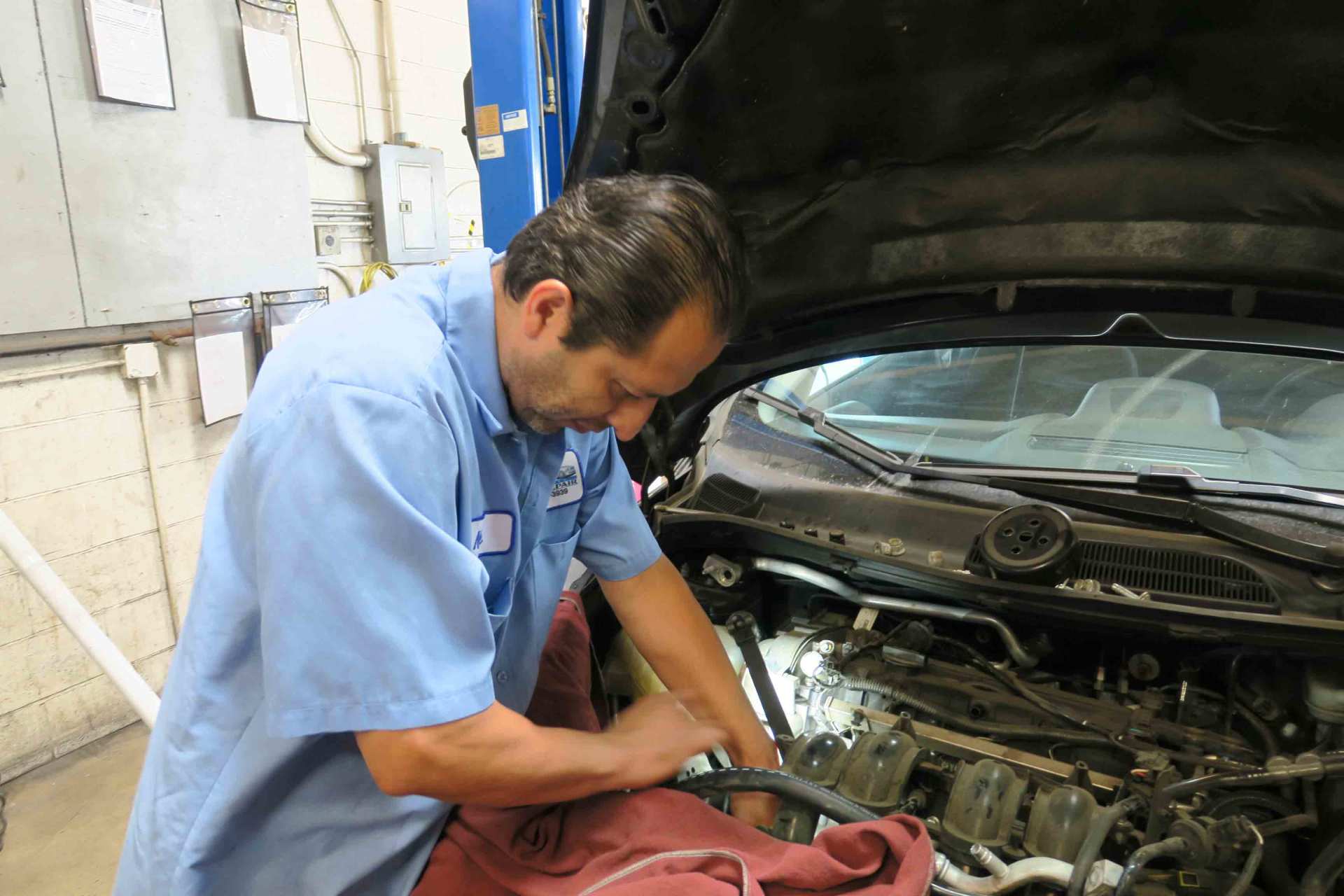 Tire Repair — Auto Mechanic Fixing Car Engine in Ontario, California