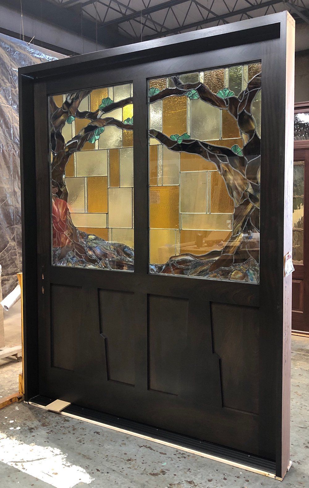 Custom stained glass in pivot entry door