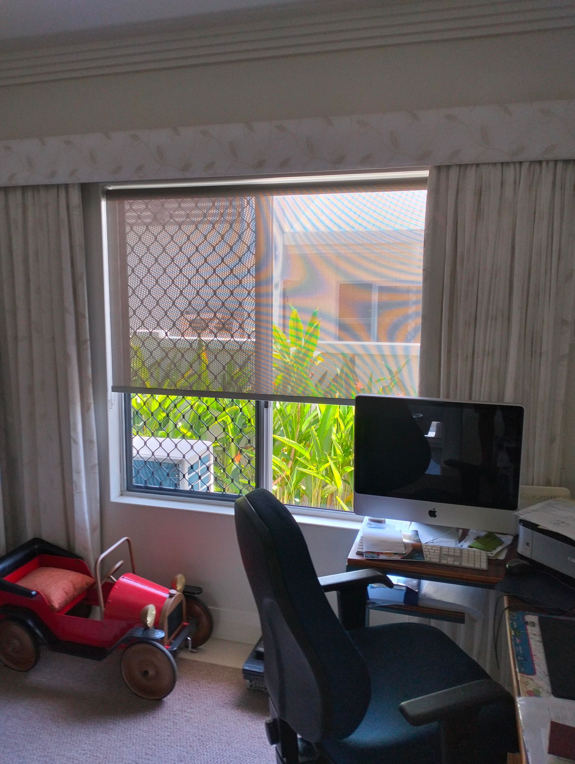 A Window With Curtains and a Roller Shade — Seaview Blinds & Shutters in Woodbury, QLD