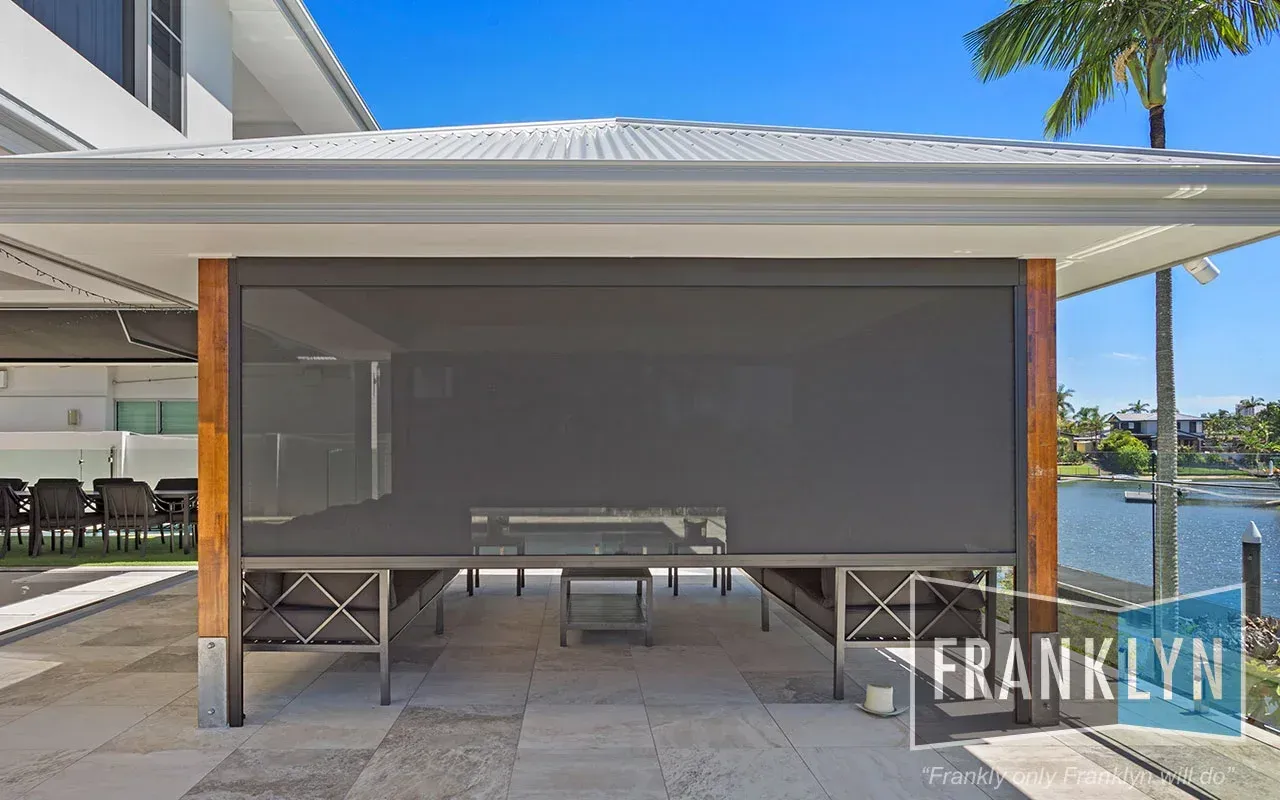 Outdoor Patio With Gray Sunshade — Seaview Blinds & Shutters in Woodbury, QLD