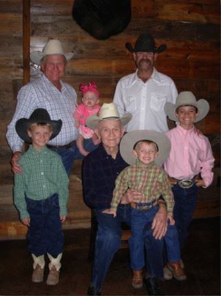 a group of people wearing cowboy hats are posing for a picture