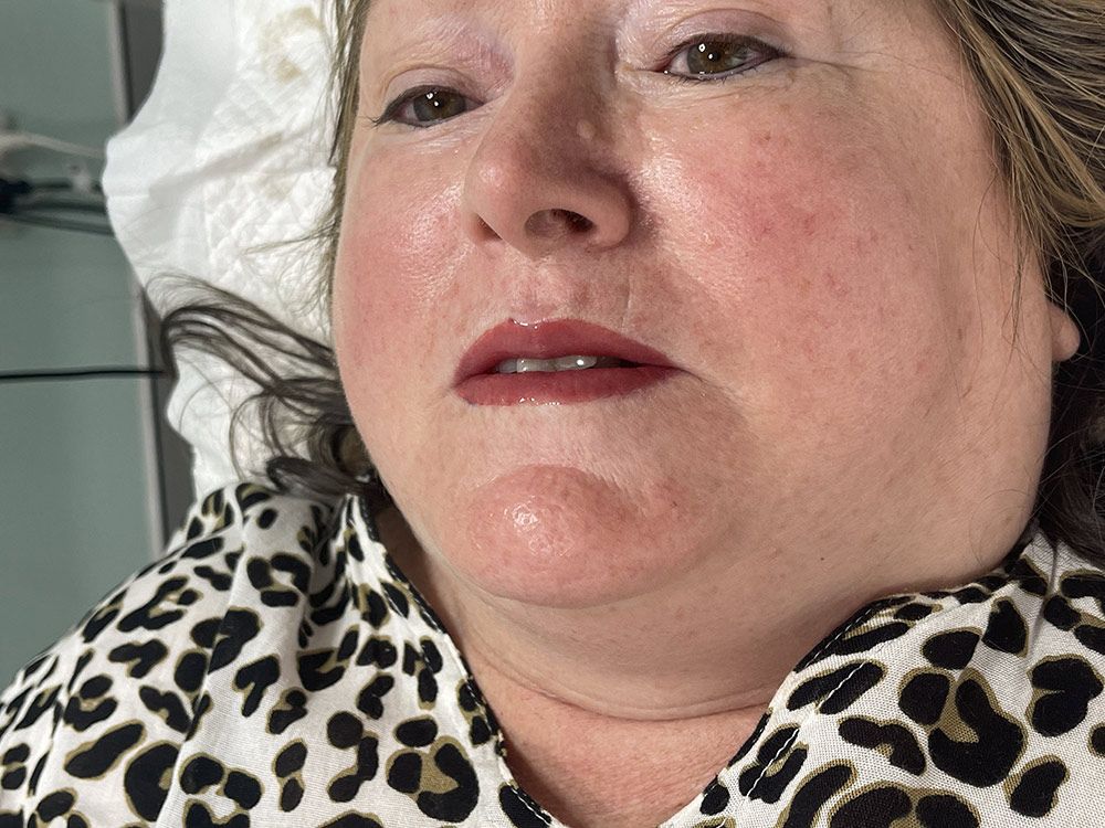 A Close up Of a Woman 's Face Wearing a Leopard Print Shirt — Brow & Lash Clinic In Cairns