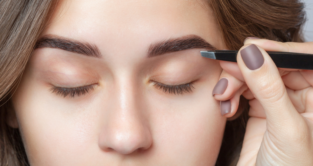 Close-Up of a Woman Getting Eye Brows Done — Brow & Lash Clinic In Cairns