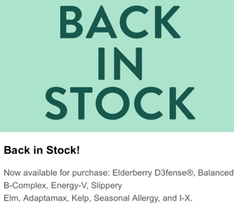 a green sign that says back in stock