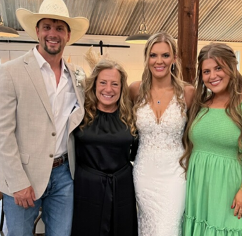 family; hugging; joy; wedding reception