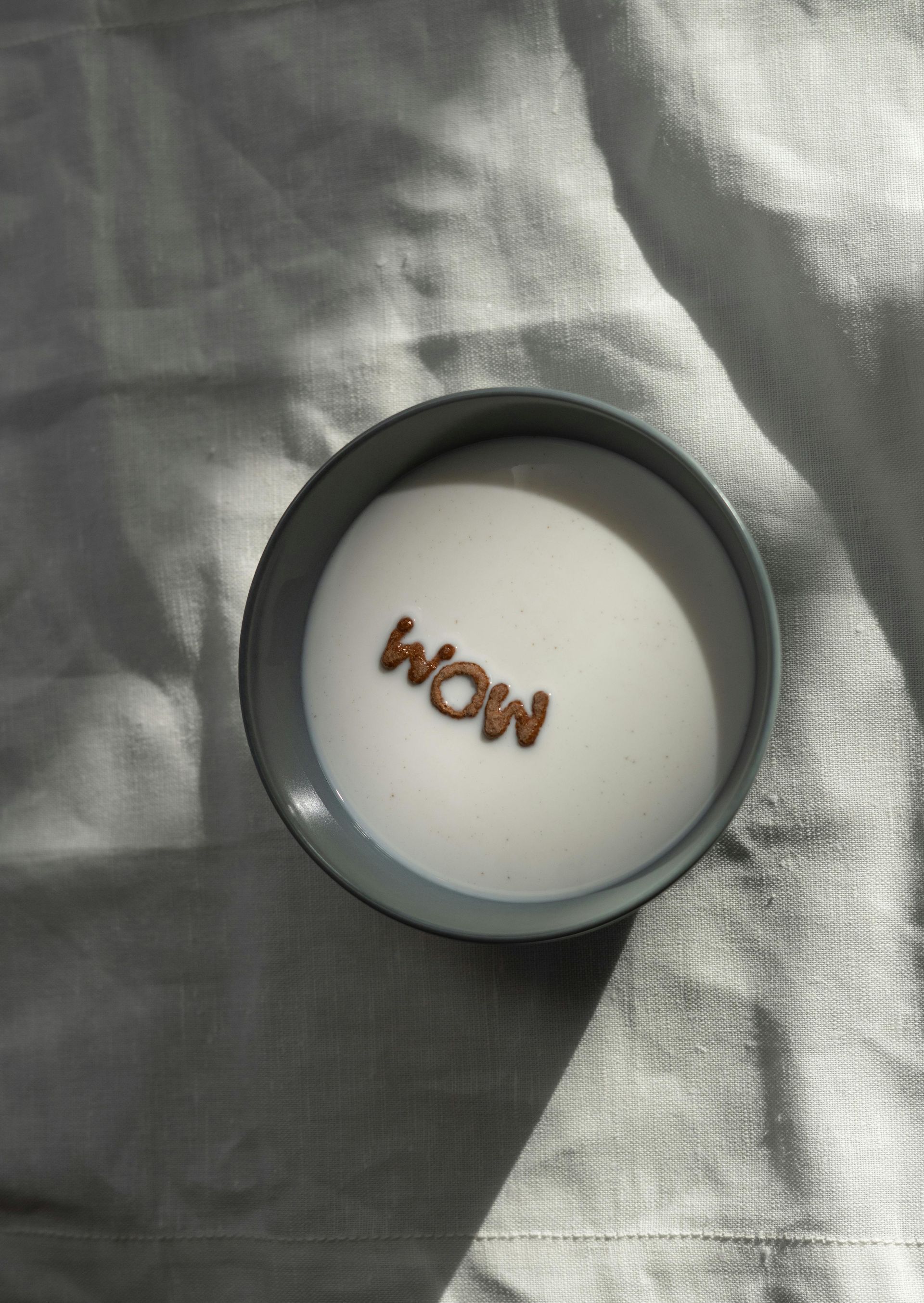 button with WOW expressed on it
