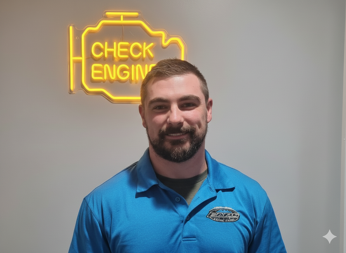 Brandon Holding Award In Office | Cole's Auto Repair & Service