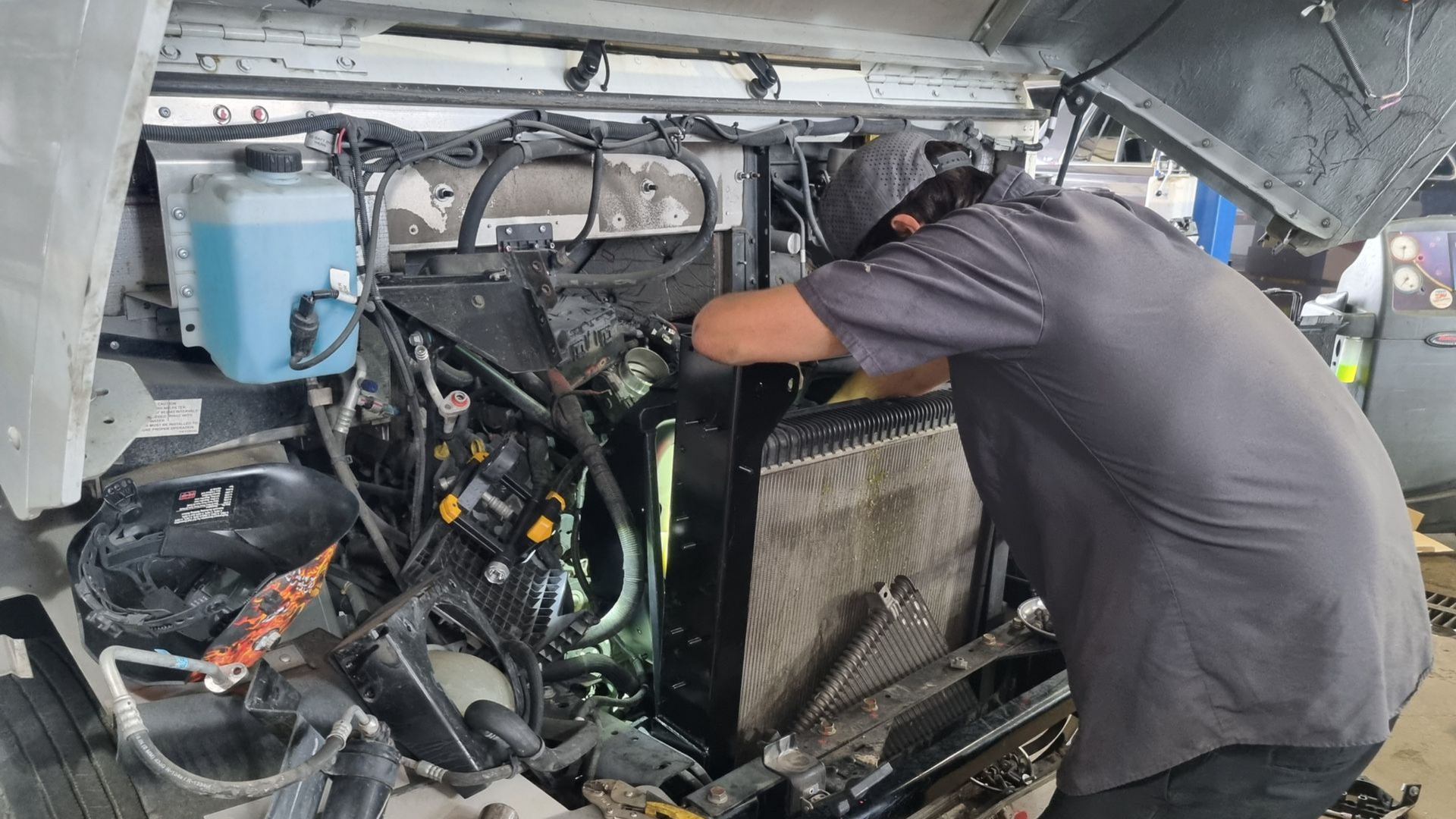 Mechanic Repairing Vehicle Engine | Cole's Auto Repair & Service