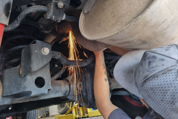 Exhaust Welding Work With Sparks | Cole's Auto Repair & Service