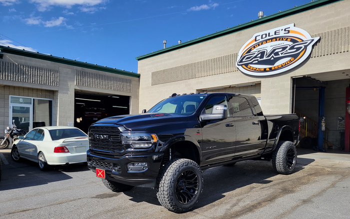 Black Pickup Truck Parked Outside | Cole's Auto Repair & Service
