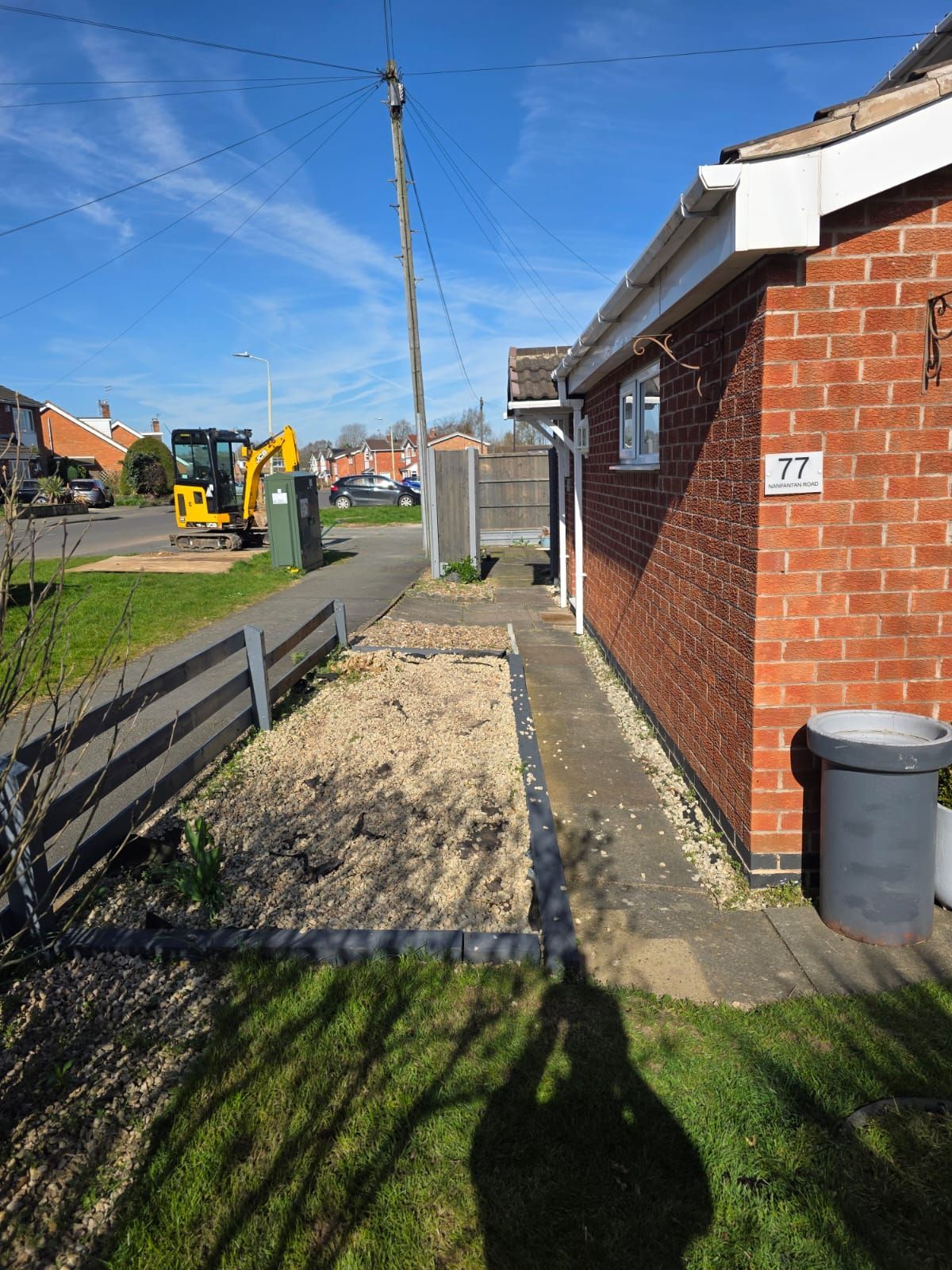 before resin pathway installation at front of house