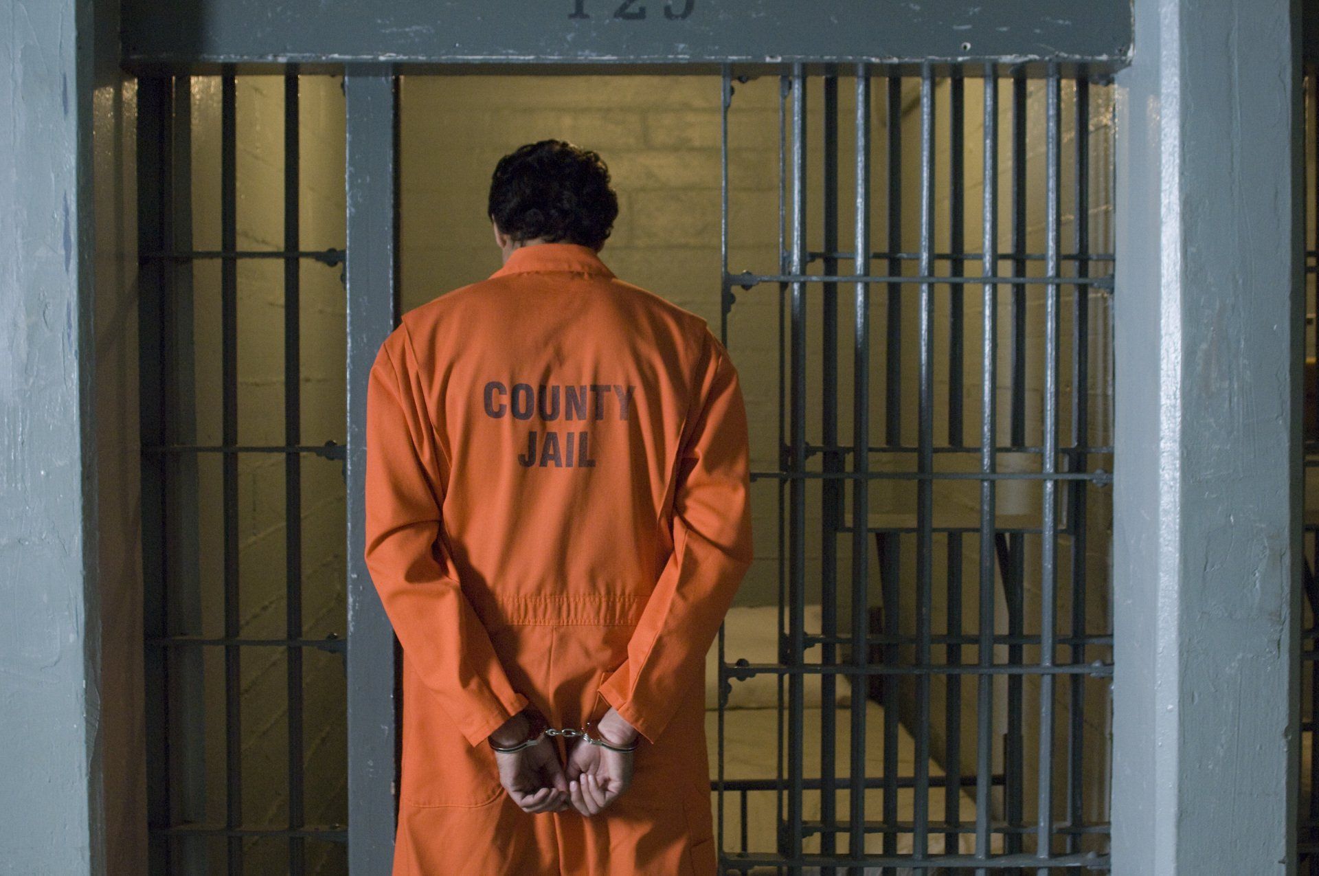 Bail Bonds Now — Handcuffed Prisoner in Jail in Overland Park, KS