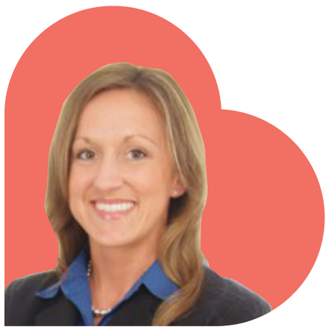 Woman in a business suit smiles, set against a coral heart background.
