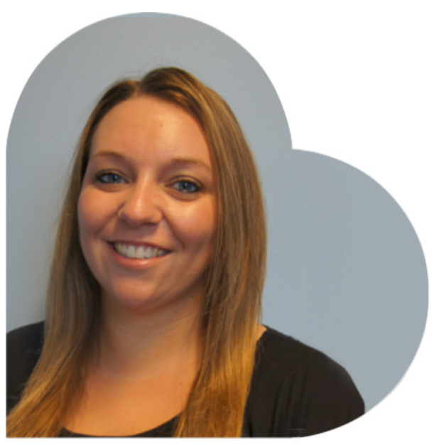Woman with long blonde hair, smiling at the camera, wearing a black shirt, inside a heart-shaped frame.