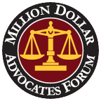 The logo for the million dollar advocates forum is a scale of justice in a circle.