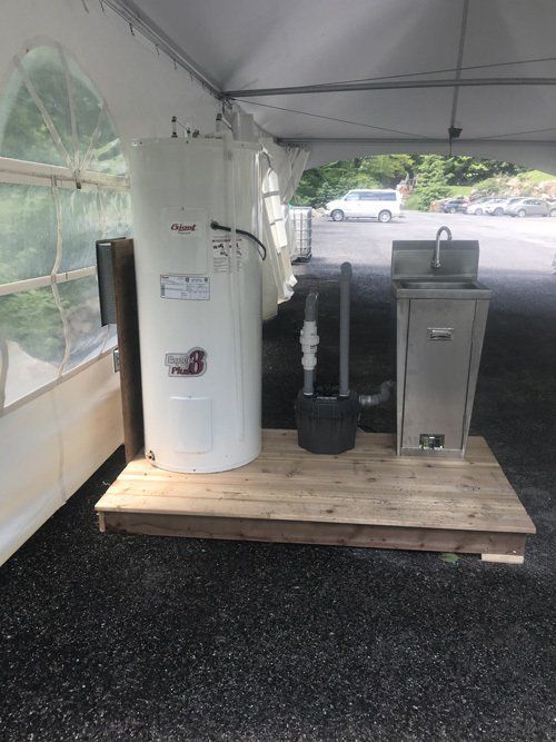 Installation de chauffe-eau extérieur temporaire