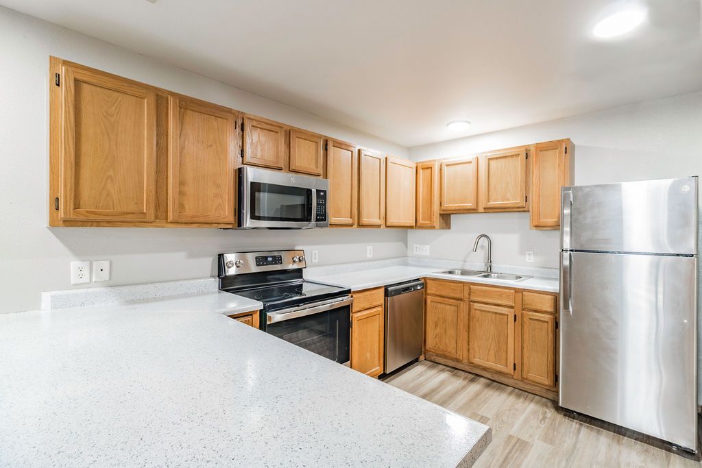 the Ridges at bentonville kitchen with counter, dishwasher