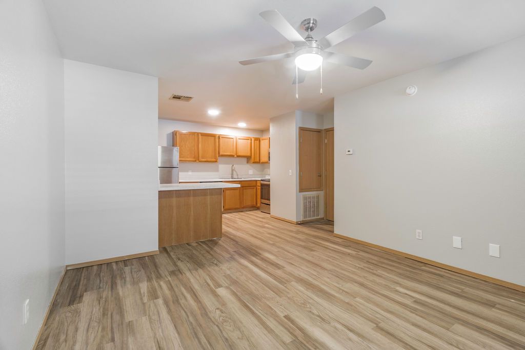 living room area with kitchen
