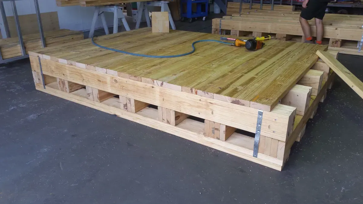 Wooden Crate Being Constructed with Pneumatic Nail Gun — DGW Wholesale Timber & Hardware in Singleton, NSW