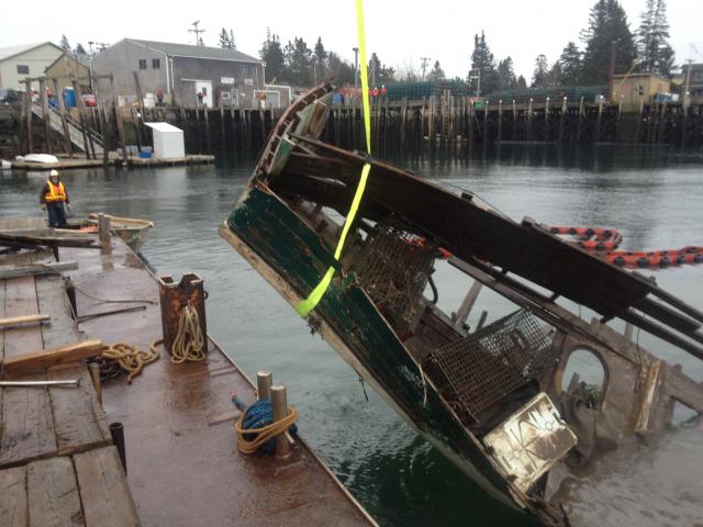 Boat Recovery — Broken Boat Pulling Above The Water in Thomaston, ME
