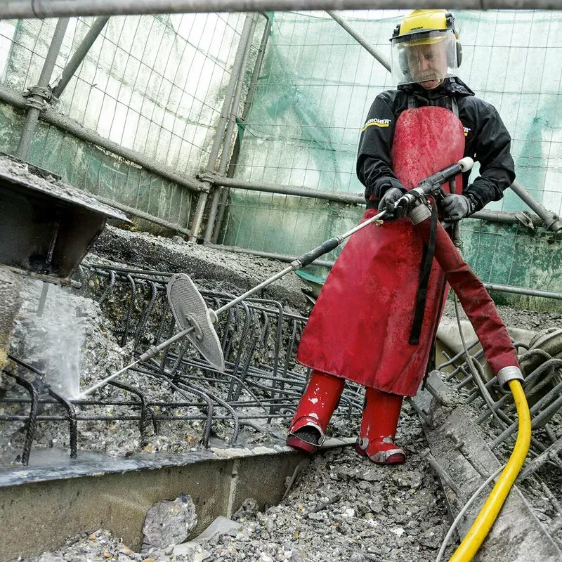 A building under construction with a lot of balconies