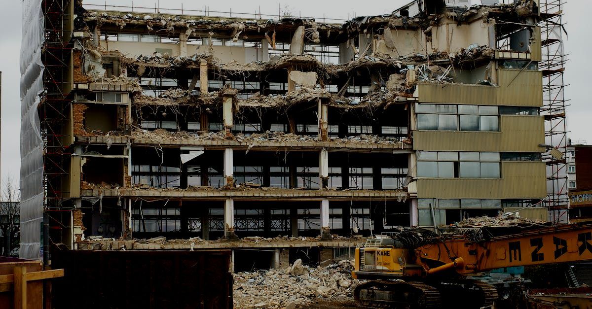 A large excavator is working on a construction site.