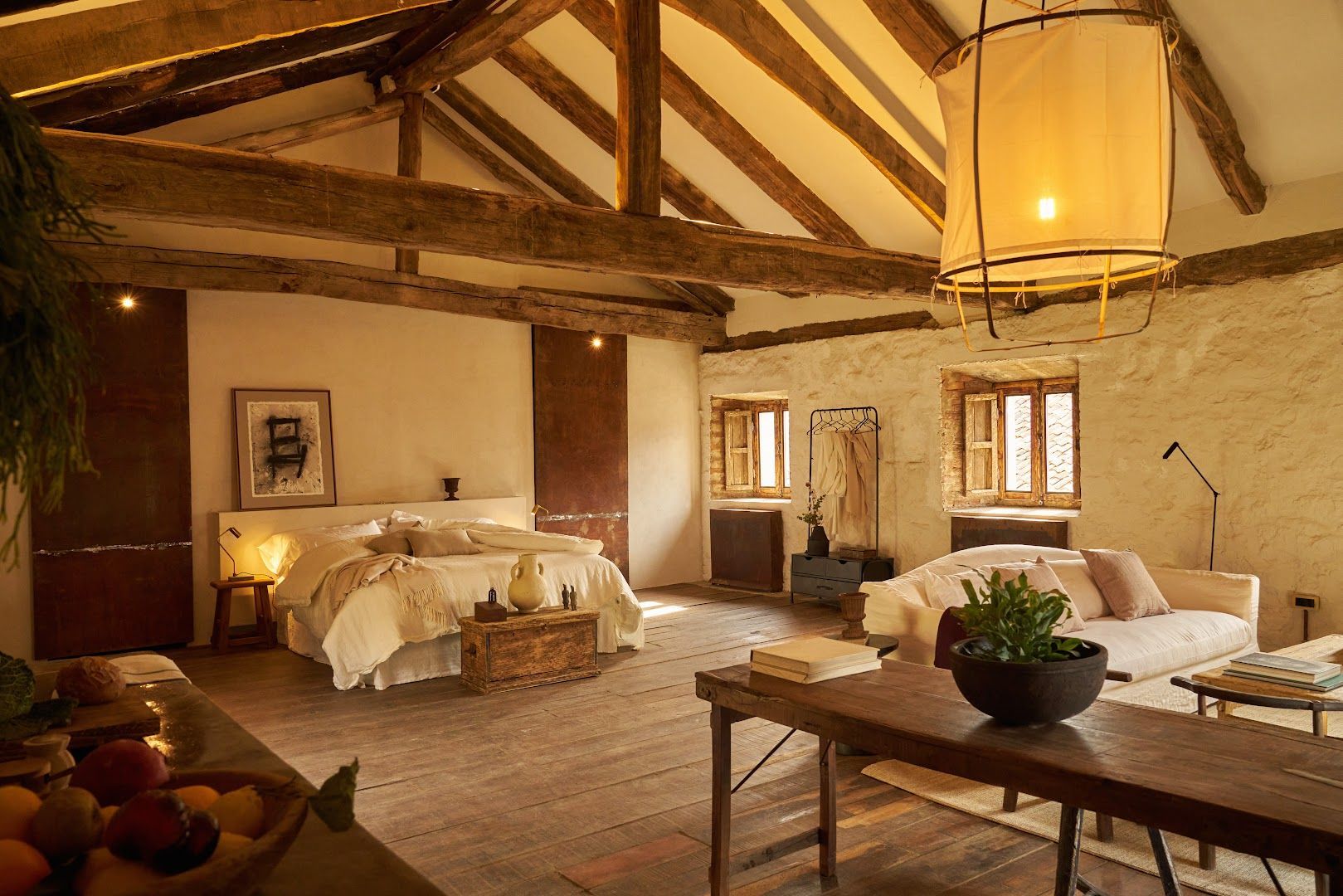 Panoramic view of the living room and bedroom of apartment 7. One of our best suites. 4-meter high wooden ceilings.