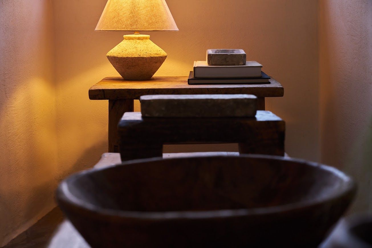 Decorative objects from apartment 1. Loft category. Wabi sabi wooden bowls and antique frieze moulds.