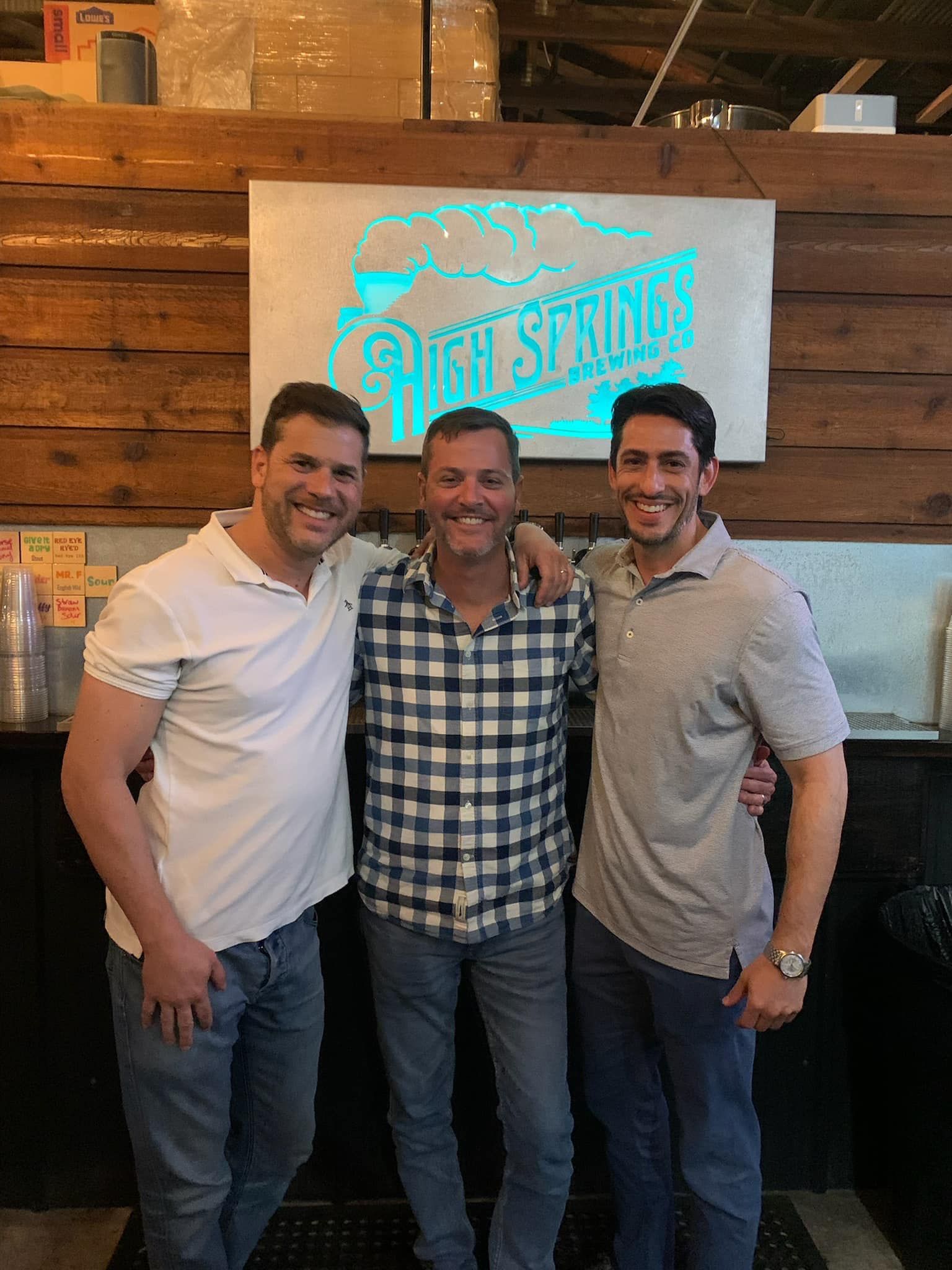 Photo of two StayGainesville Partners and owner of High Springs Brewing Co