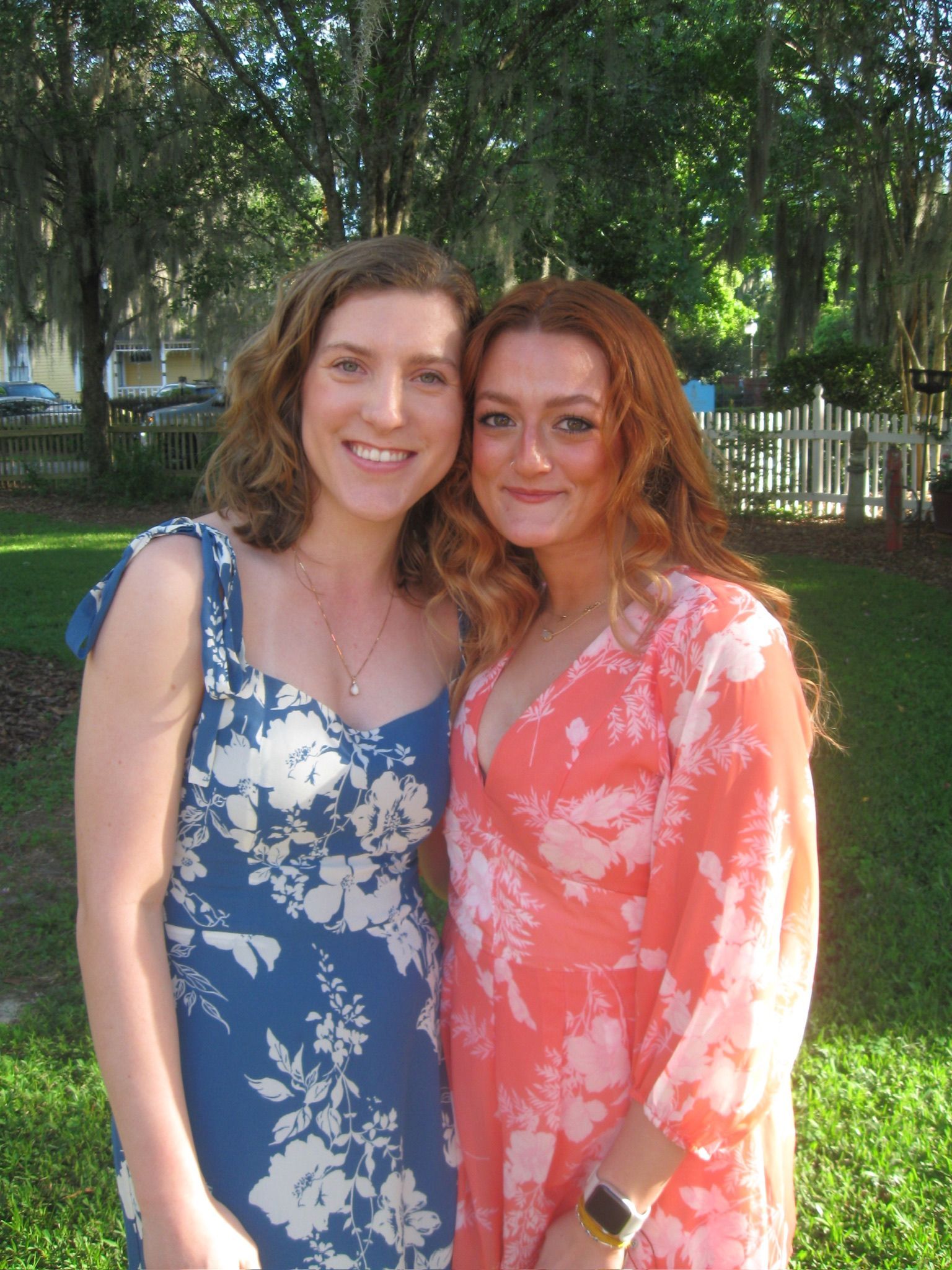 women smiling together outside the laurel oak inn