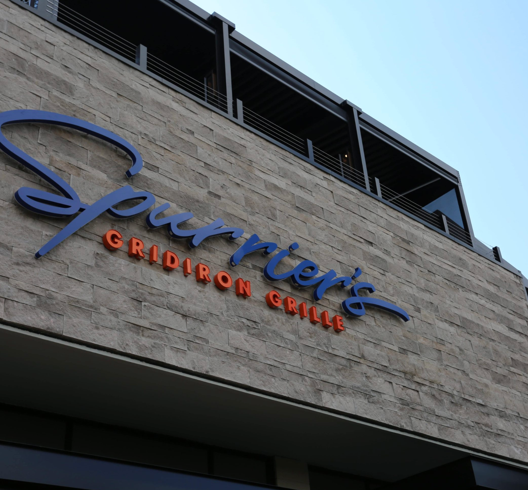 The Spurrier's Gridiron Grill sign in Celebration Pointe.