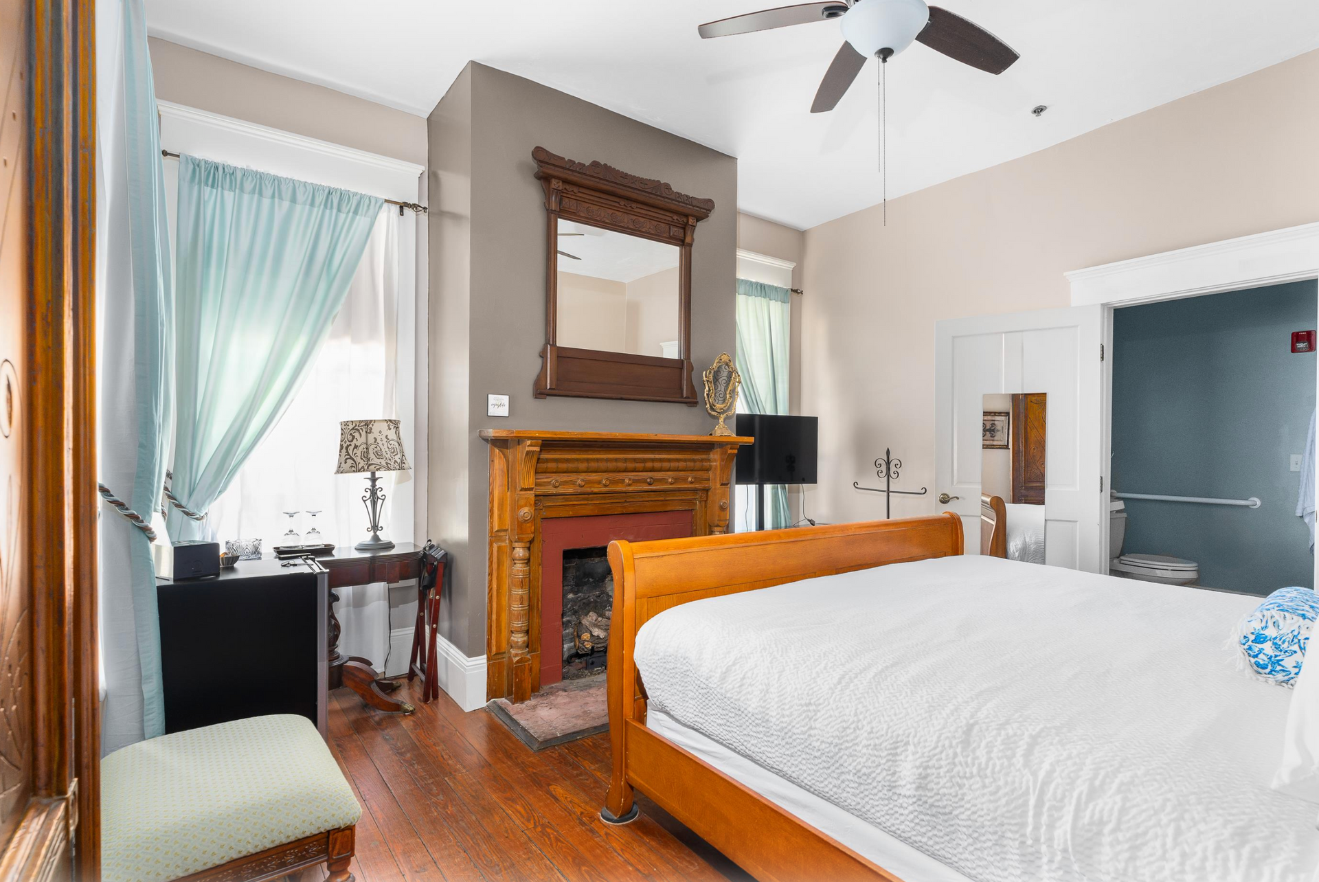The first floor bedroom features accessibility doors and bathroom.
