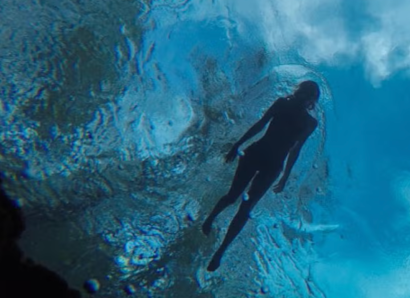 Swimmer at Ginnie Springs near Gainesville, FL. StayGainesville.
