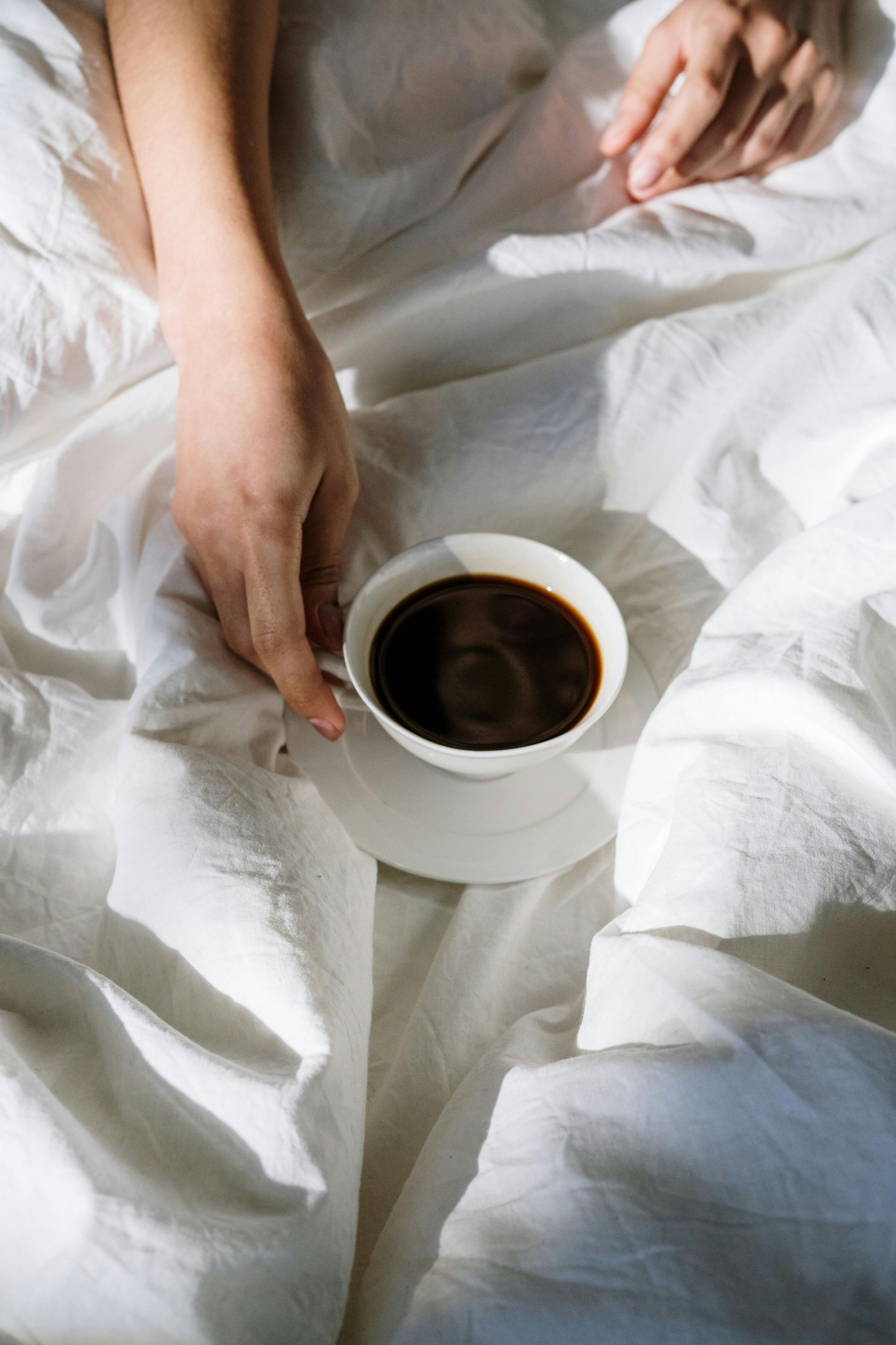 Coffee in bed at a StayGainesvlle vacation rental