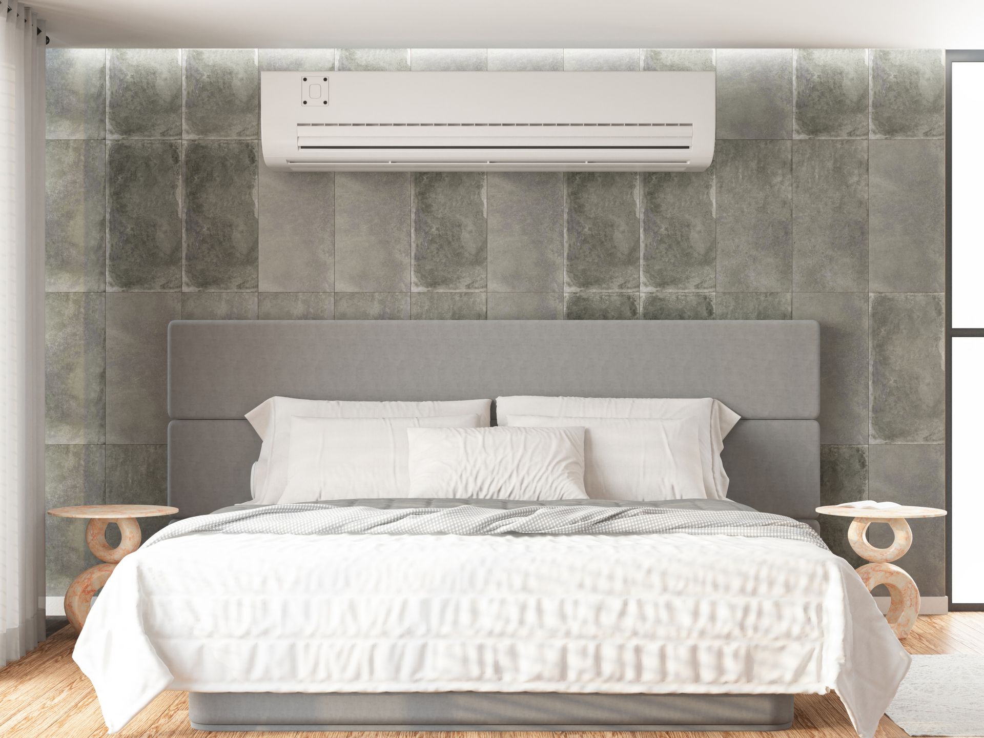 A large white air conditioner is sitting outside of a building.