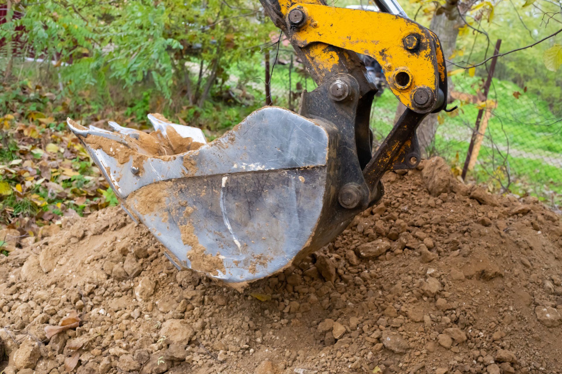 Digging Soil with Excavator Truck — Plymouth, IN — Creed Septic System Specialist