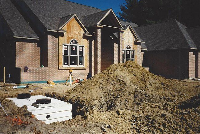 Septic Tank Installed Into Ground — Plymouth, IN — Creed Septic System Specialist
