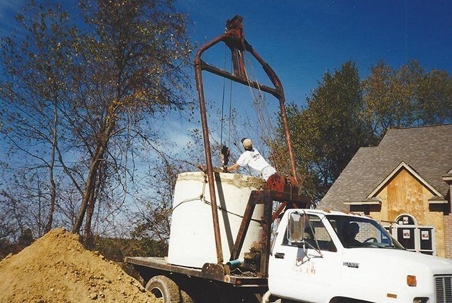 Man Assisting the Septic Tank — Plymouth, IN — Creed Septic System Specialist