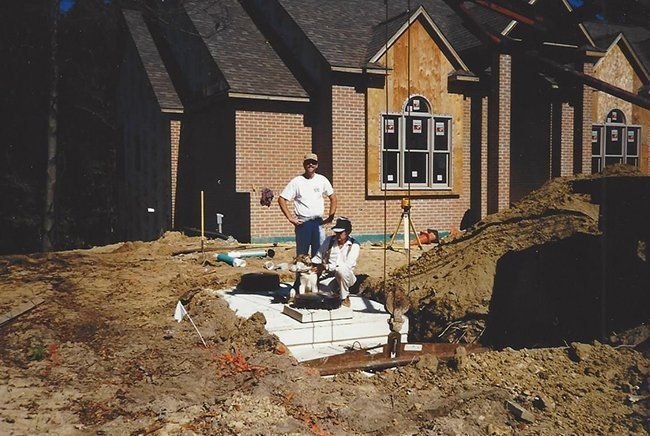 Two Workers Installing the Septic Tank — Plymouth, IN — Creed Septic System Specialist