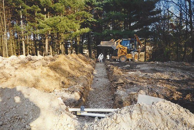 Excavator Truck — Plymouth, IN — Creed Septic System Specialist